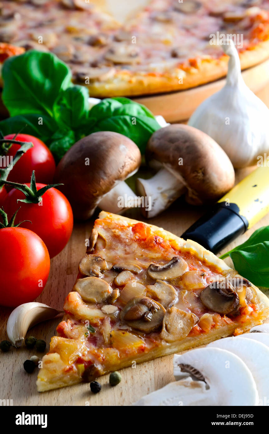 delicous fresh italian mushroom pizza and ingrdients Stock Photo