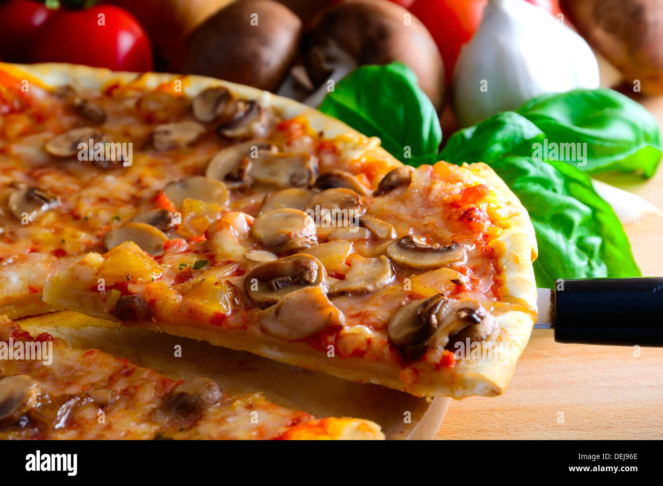 slice of traditional homemade italian pizza Stock Photo
