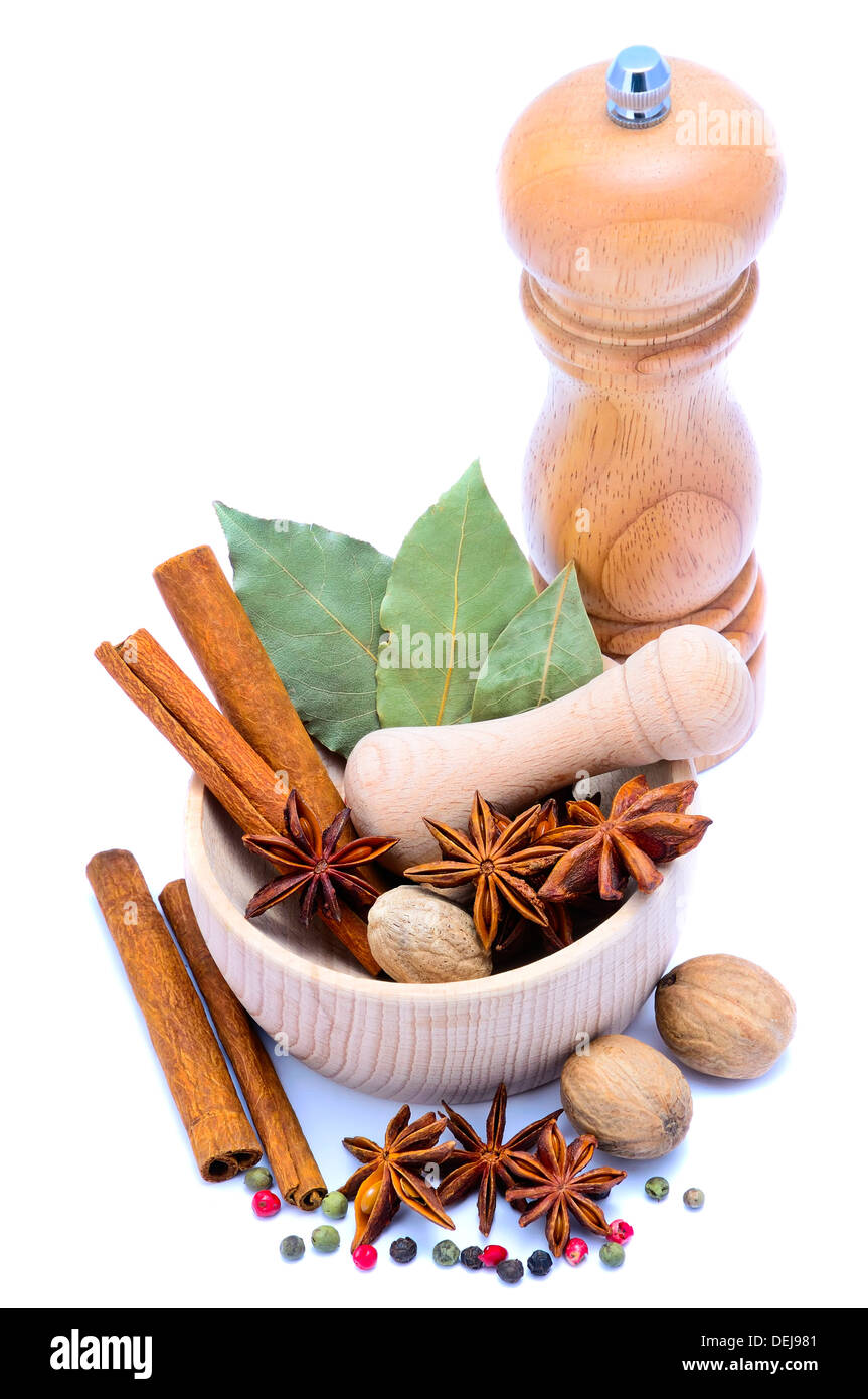 different spice with pepper mill, mortar and pestle isolated on a white background Stock Photo