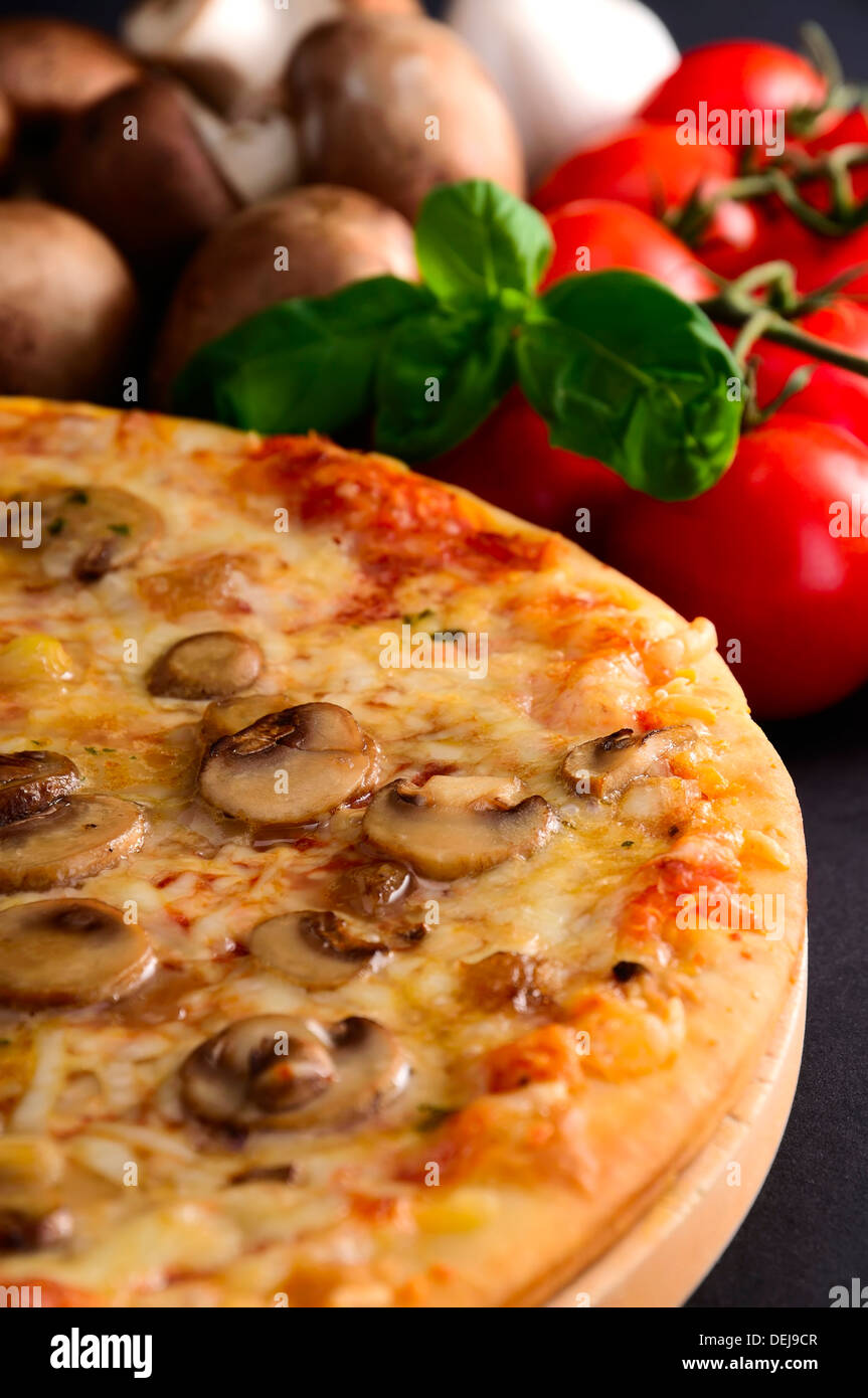 still life with pizza and ingredients Stock Photo