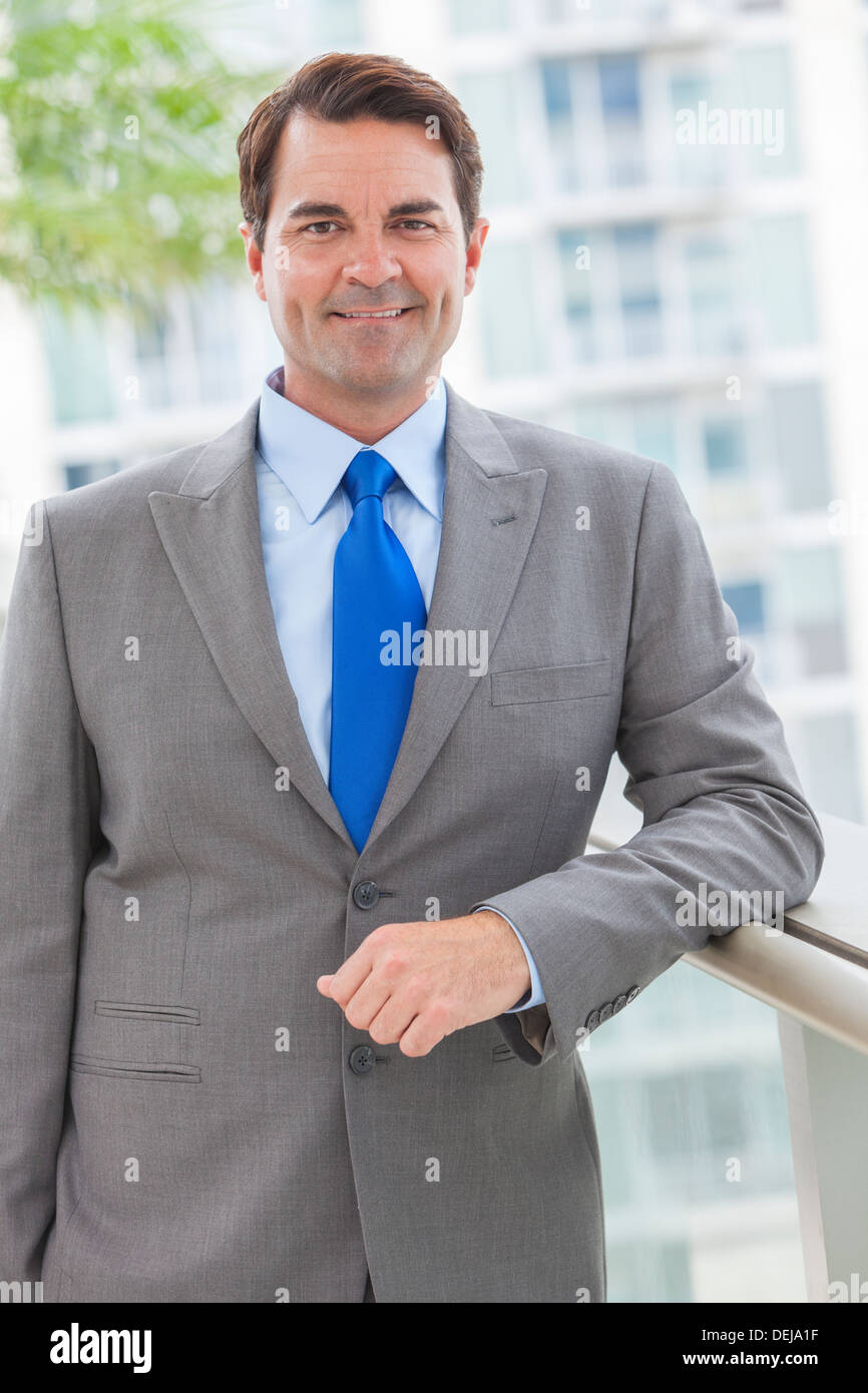 Business man in blue suit hi-res stock photography and images - Alamy