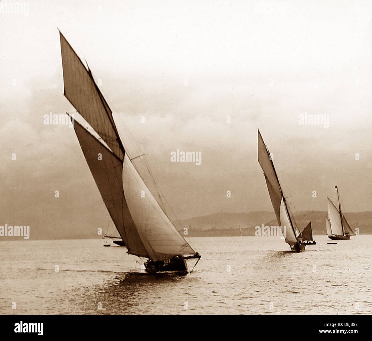 Racing yachts on the River Clyde Victorian period Stock Photo