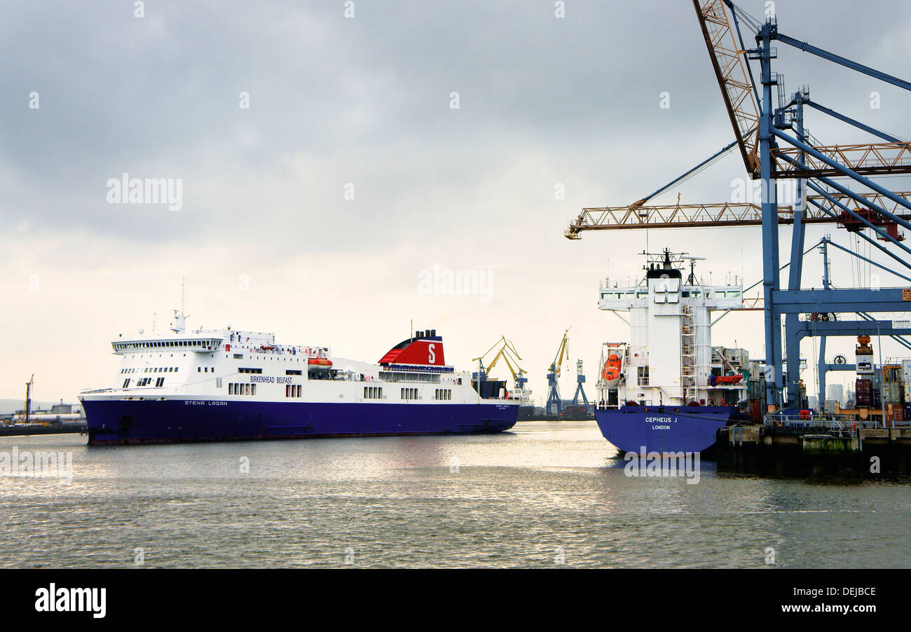 Belfast Harbour, Port of Belfast, Northern Ireland. Passenger ferry Stena Lagan passing container dock facility on west bank Stock Photo