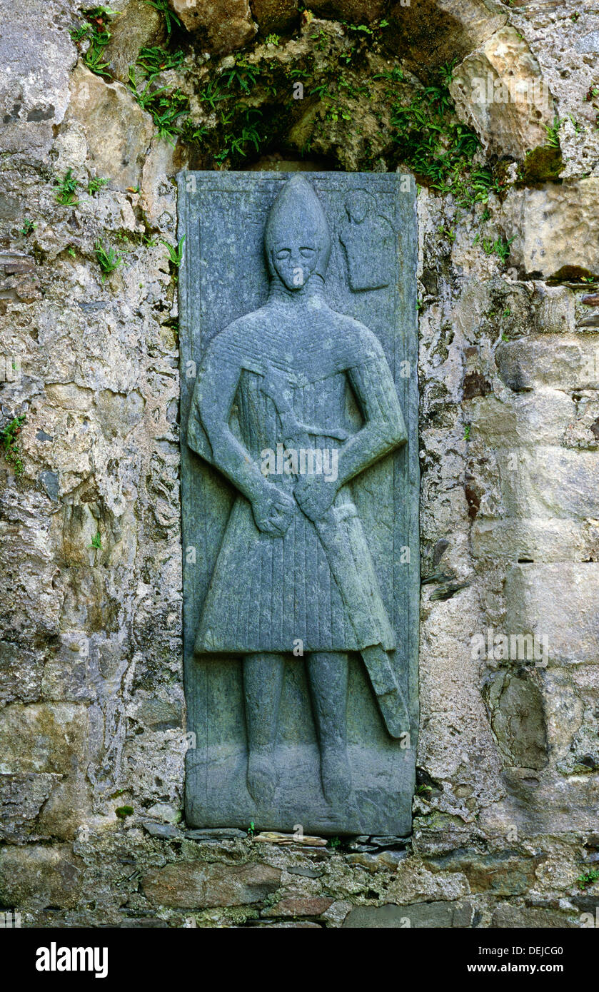 Stone tomb effigy of Scottish highland knight in mediaeval church of Kildalton, island of Islay, Inner Hebrides, Scotland, UK Stock Photo