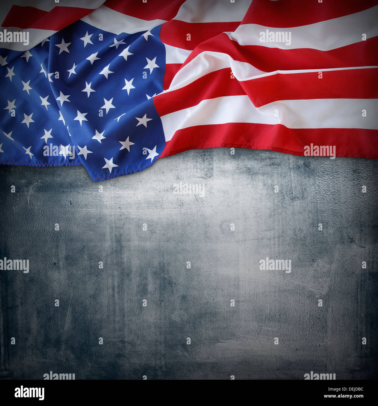 Closeup of American flag on grey background Stock Photo - Alamy