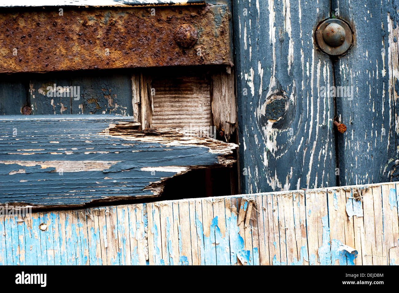 Old door in disused warehouse in South Wales, UK. Stock Photo