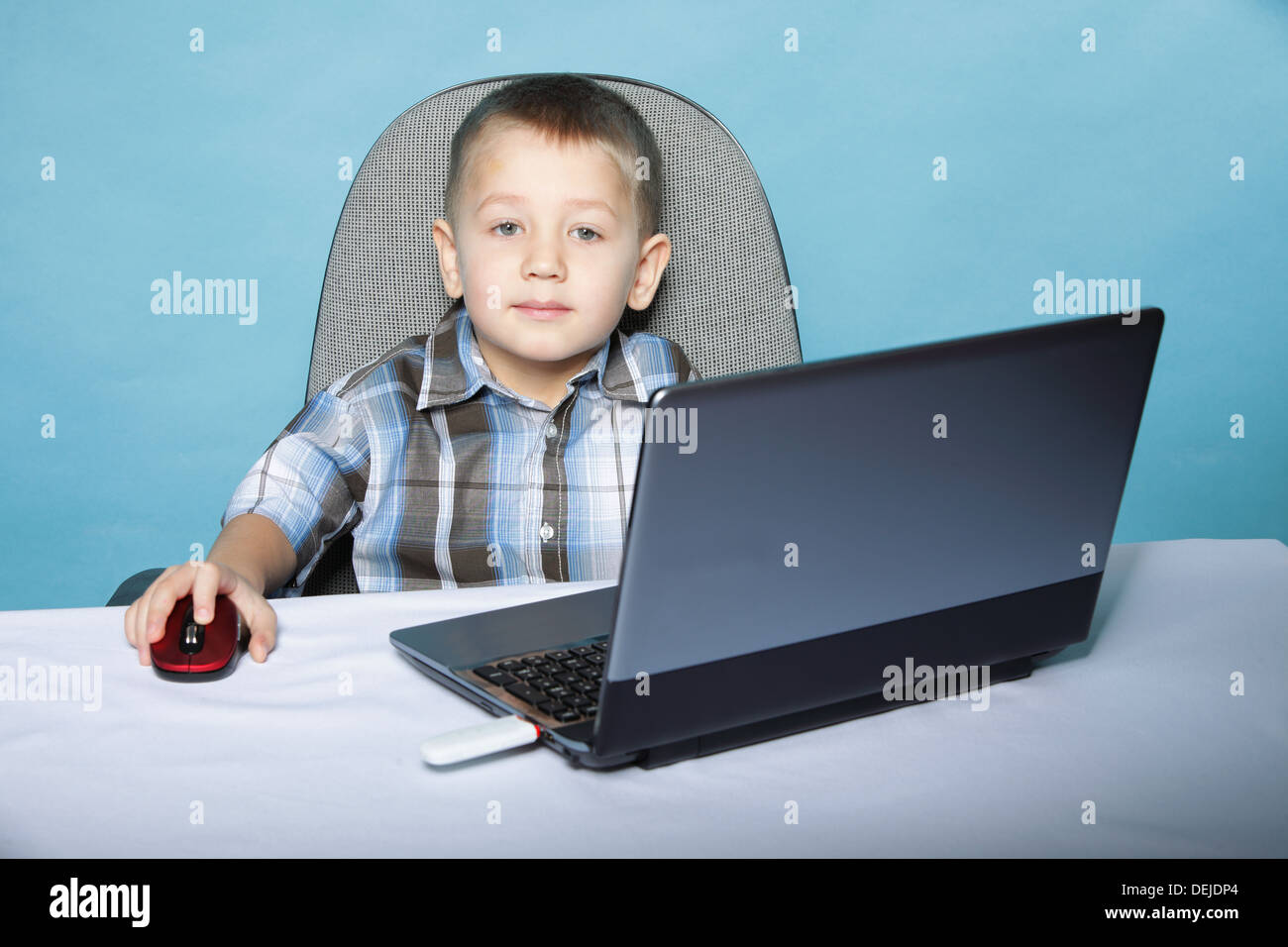 images Little Kid On Computer Stock Image https www alamy com little kid boy playing on the computer laptop technology image60642236 html