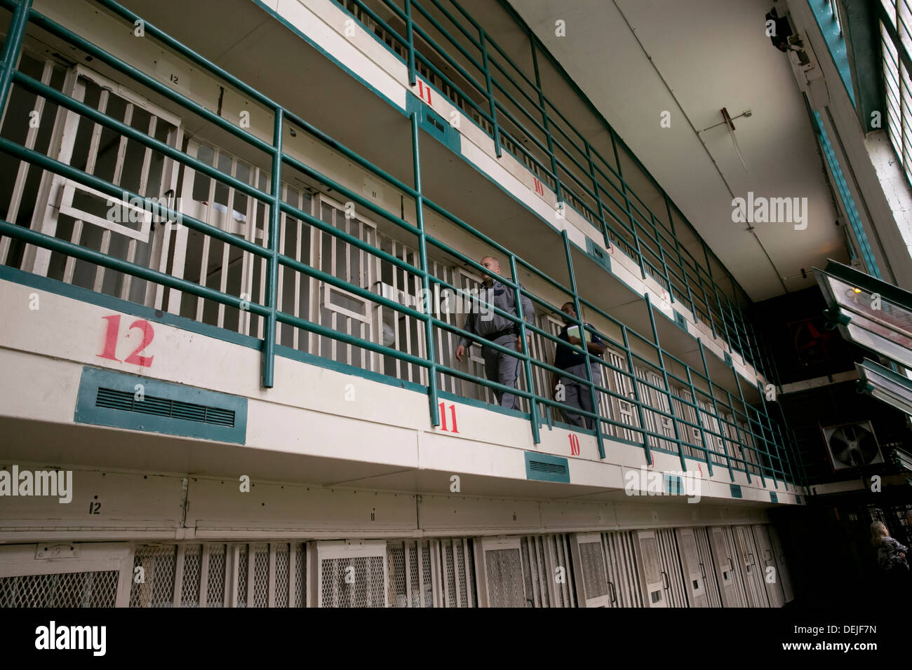 Prison guards inside prison unit near Houston, Texas walk through cells