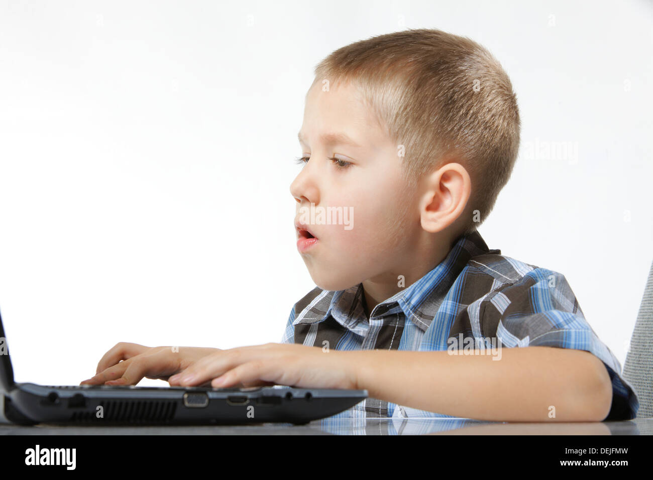 pix Little Kid On Computer Stock Image https www alamy com little kid boy playing on the computer laptop technology image60643769 html