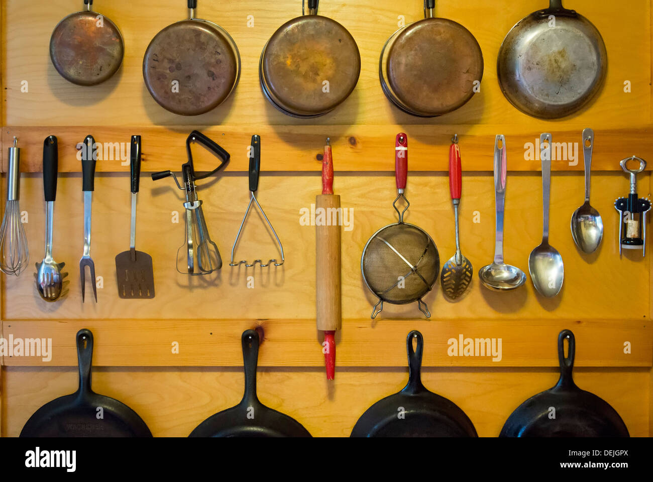 Bovina Center, New York - Pots and pans hanging on the wall of a cabin in the Catskill Mountains. Stock Photo