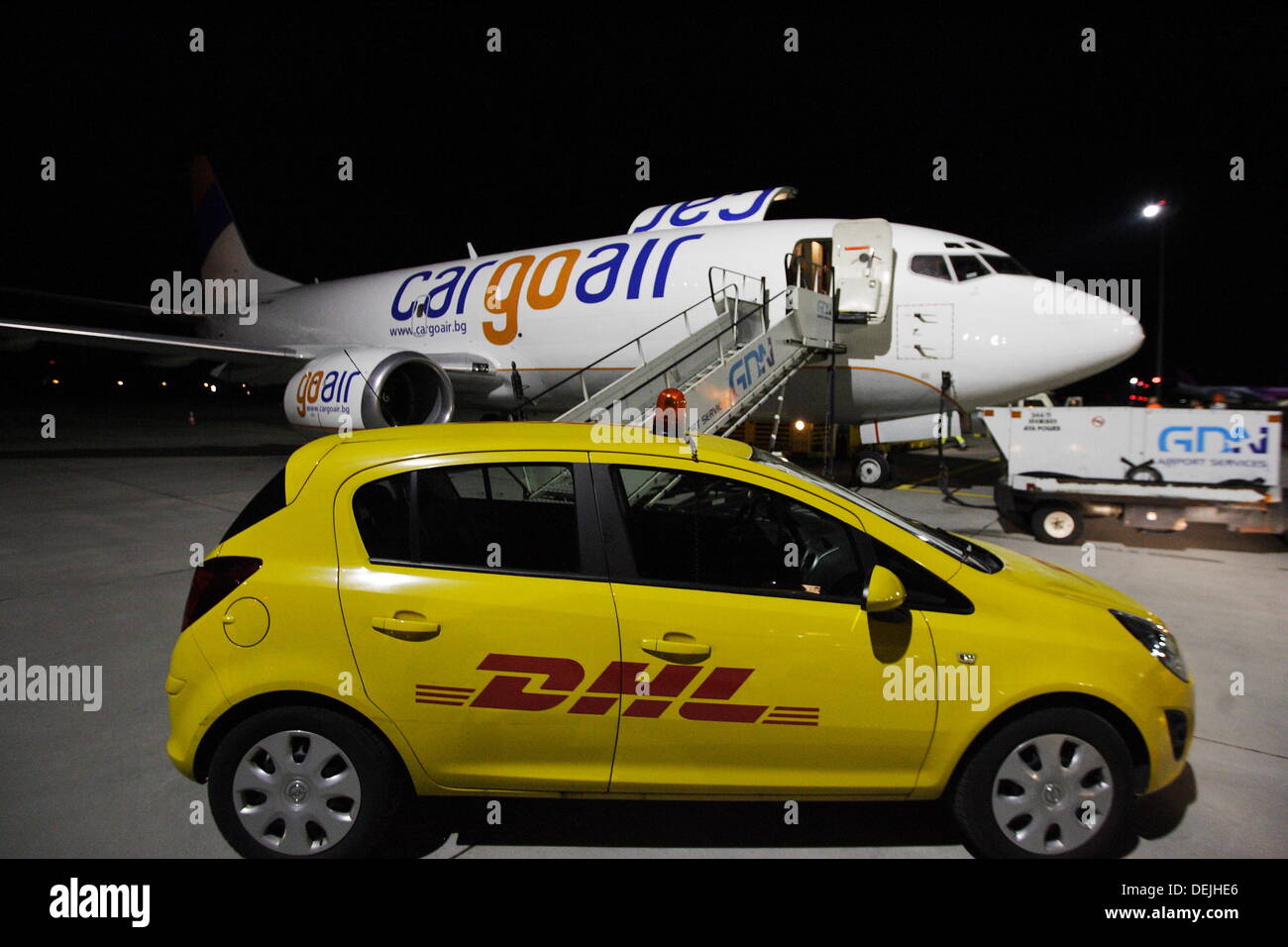 Gdansk, Poland 19th, September 2013 DHL Poland launches new Boeing 737-300f cargo aircraft on the Tallinn - Gdansk - Leipzig. New aircraft can carry over 16 tons of goods. Pictured: DHL 737-300F cargo plane sits at Lech Walesa Airport in Gdansk during loading goods. Credit:  Michal Fludra/Alamy Live News Stock Photo