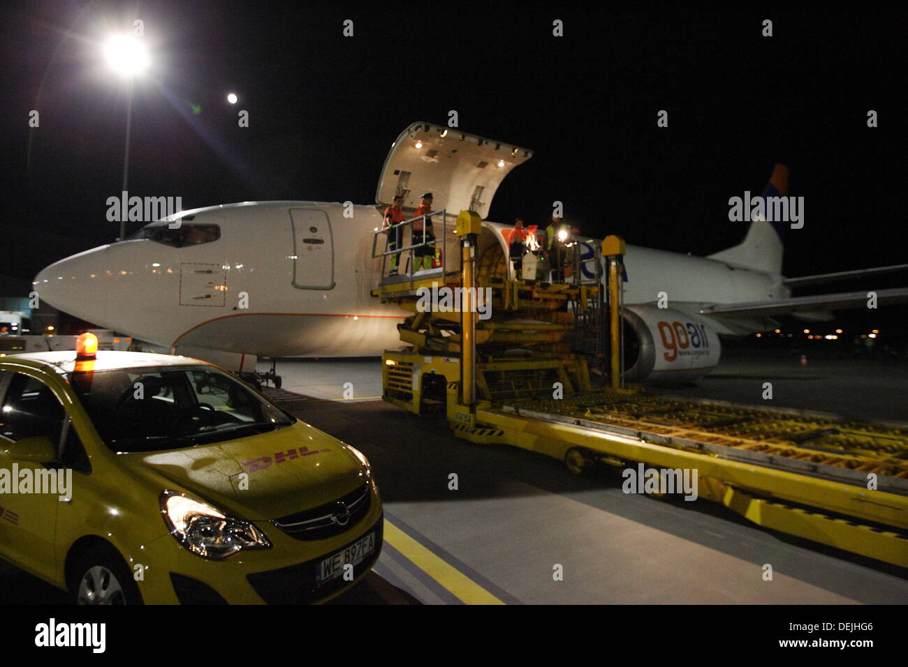 Gdansk, Poland 19th, September 2013 DHL Poland launches new Boeing 737-300f cargo aircraft on the Tallinn - Gdansk - Leipzig. New aircraft can carry over 16 tons of goods. Pictured: DHL 737-300F cargo plane sits at Lech Walesa Airport in Gdansk during loading goods. Credit:  Michal Fludra/Alamy Live News Stock Photo