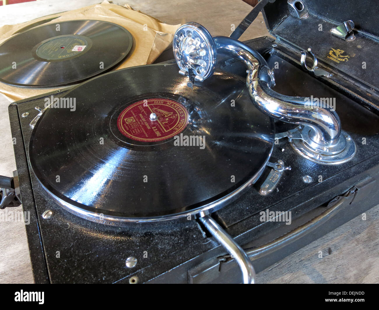 Portable Wind Up Gramophone Record Player with 78rpm Vinyl record, England, UK Stock Photo