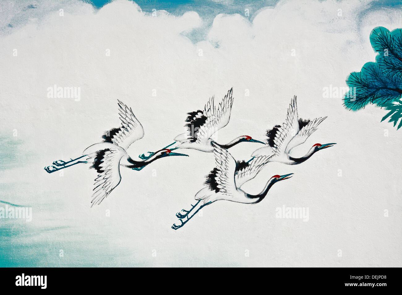 flying chinese crane bird painting on the wall Stock Photo