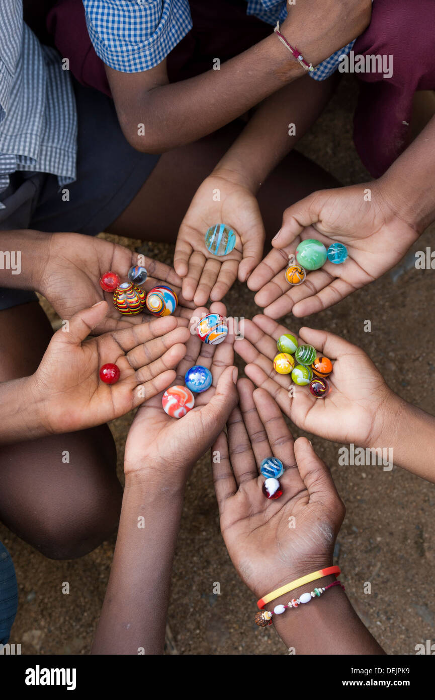 Indian Boys Hands Holding Marbles In A Circle India Stock Photo Alamy