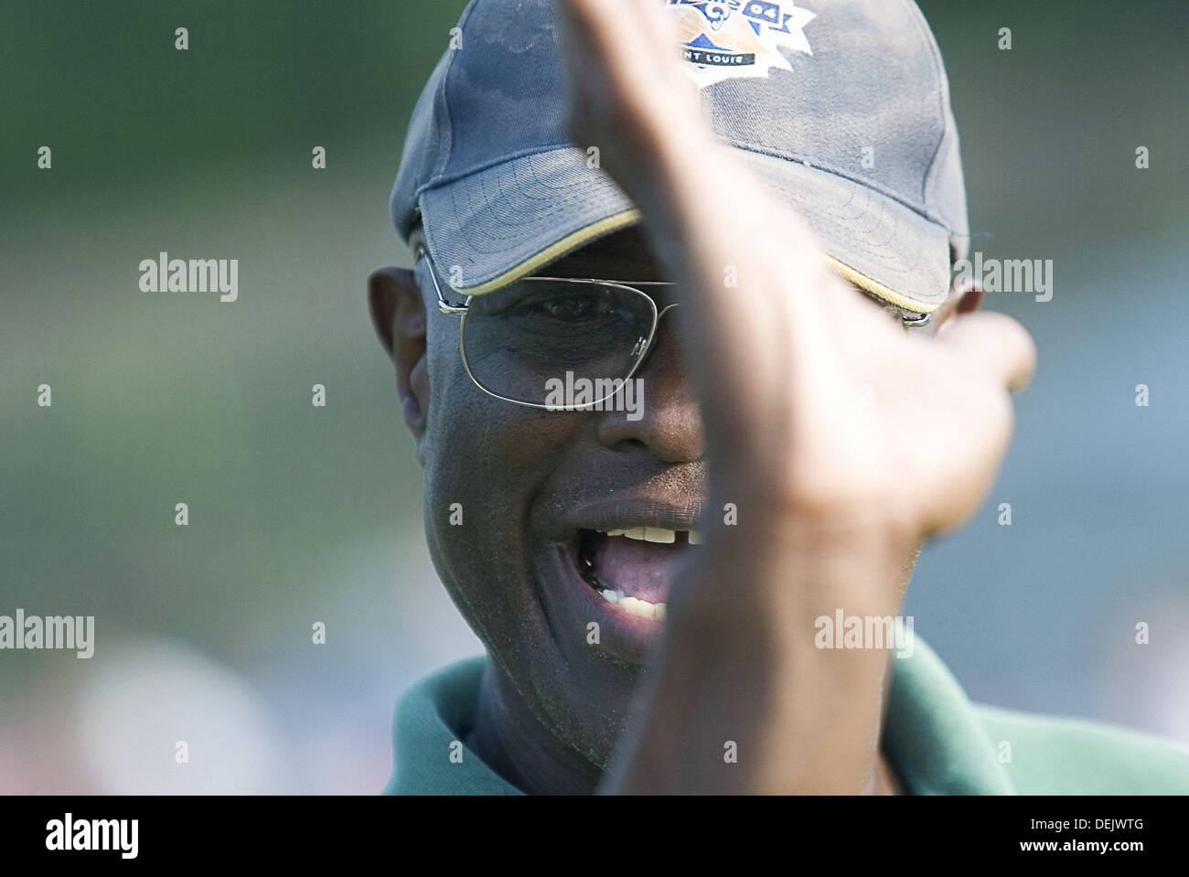 A highschool football coach explains how to properly throw the ball Stock Photo Alamy