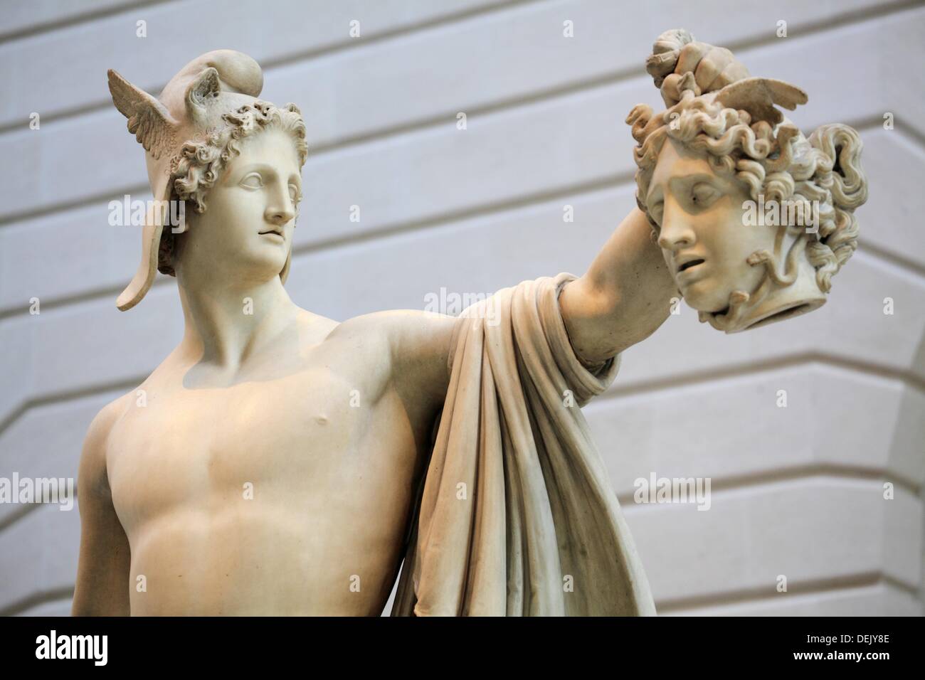 A closed up view of the marble statue of Perseus with the head of
