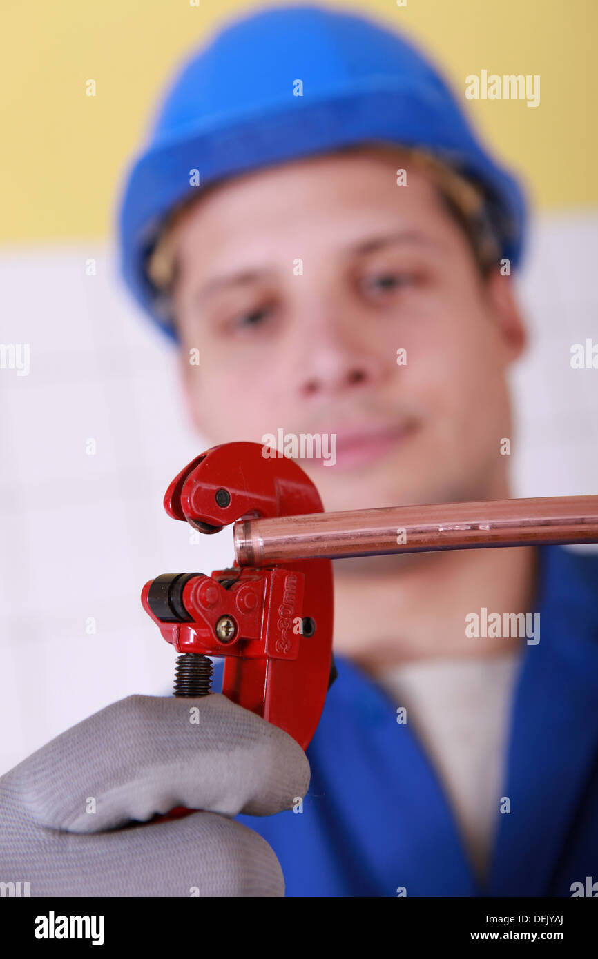 Adjusting the pipe Stock Photo Alamy