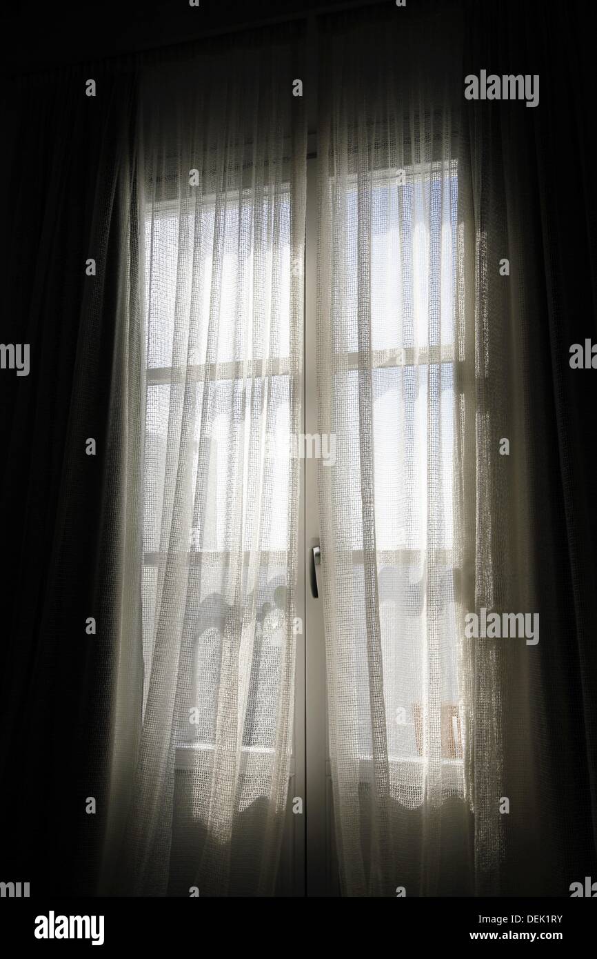 Soft Sunlight Filtering Through A Sheer Curtain French Double