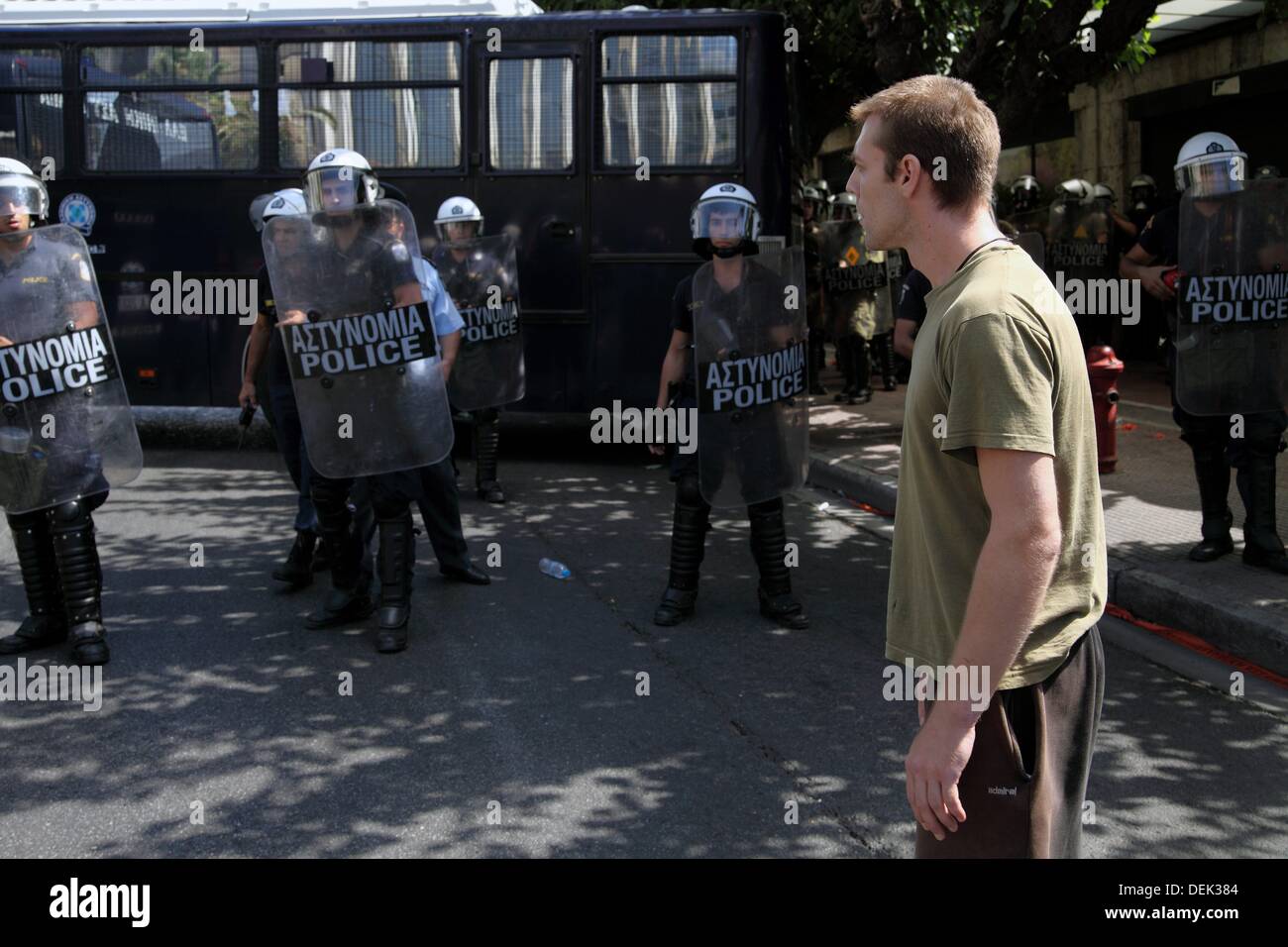 Athens, Greece. 18th Sept, 2013. Greek student in front of riot police ...