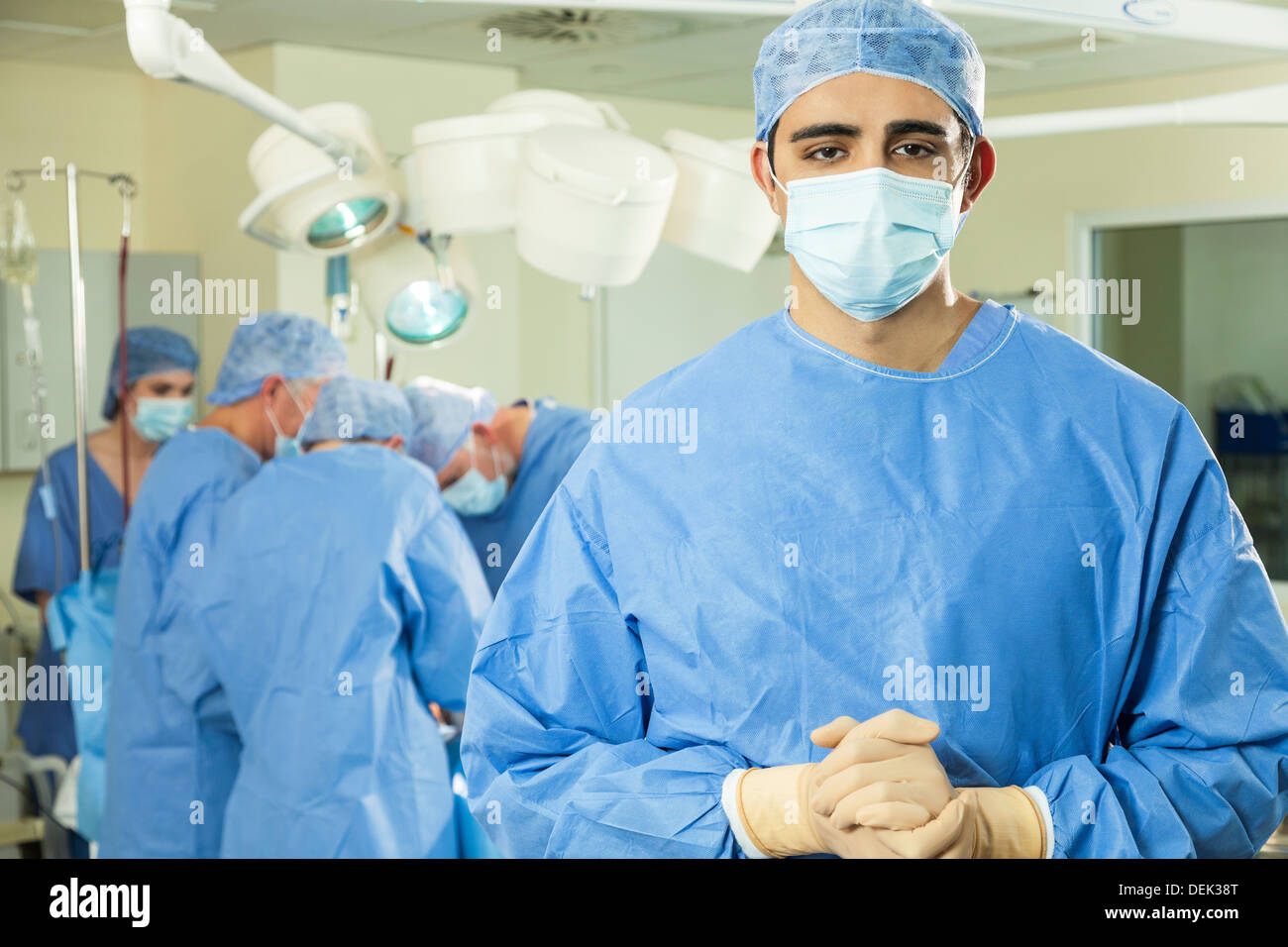 Indian Asian male surgeon & team surgical medical doctors in hospital