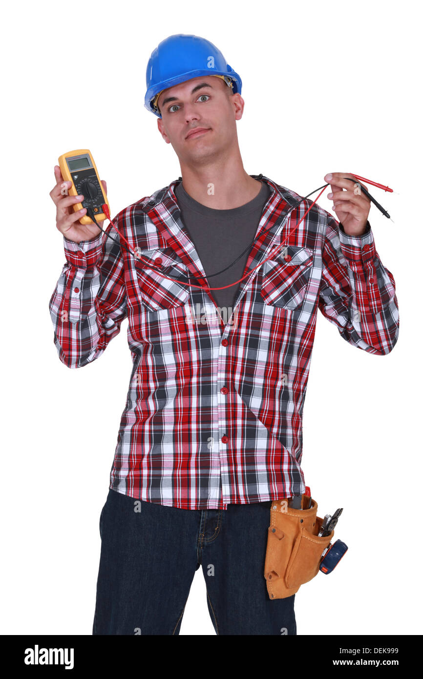 Electrician holding a tool Stock Photo Alamy