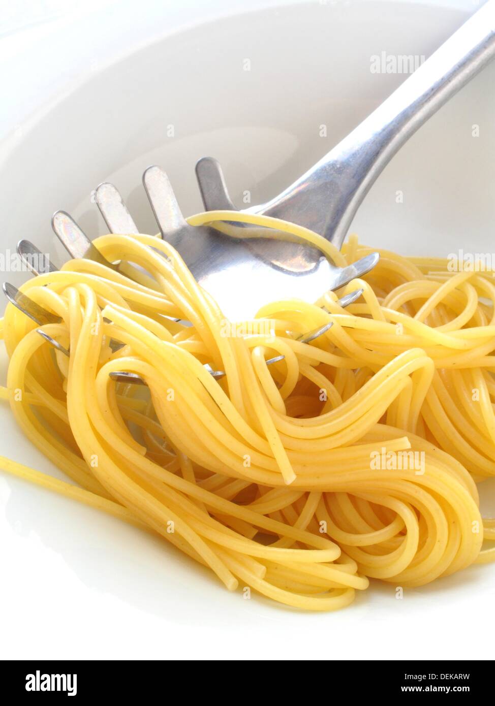Pasta fork and spaguetti Stock Photo Alamy