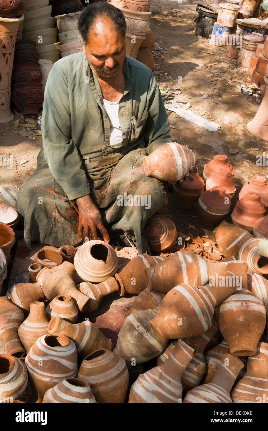 man with his ceramic pots in Cairo Egypt Stock Photo Alamy