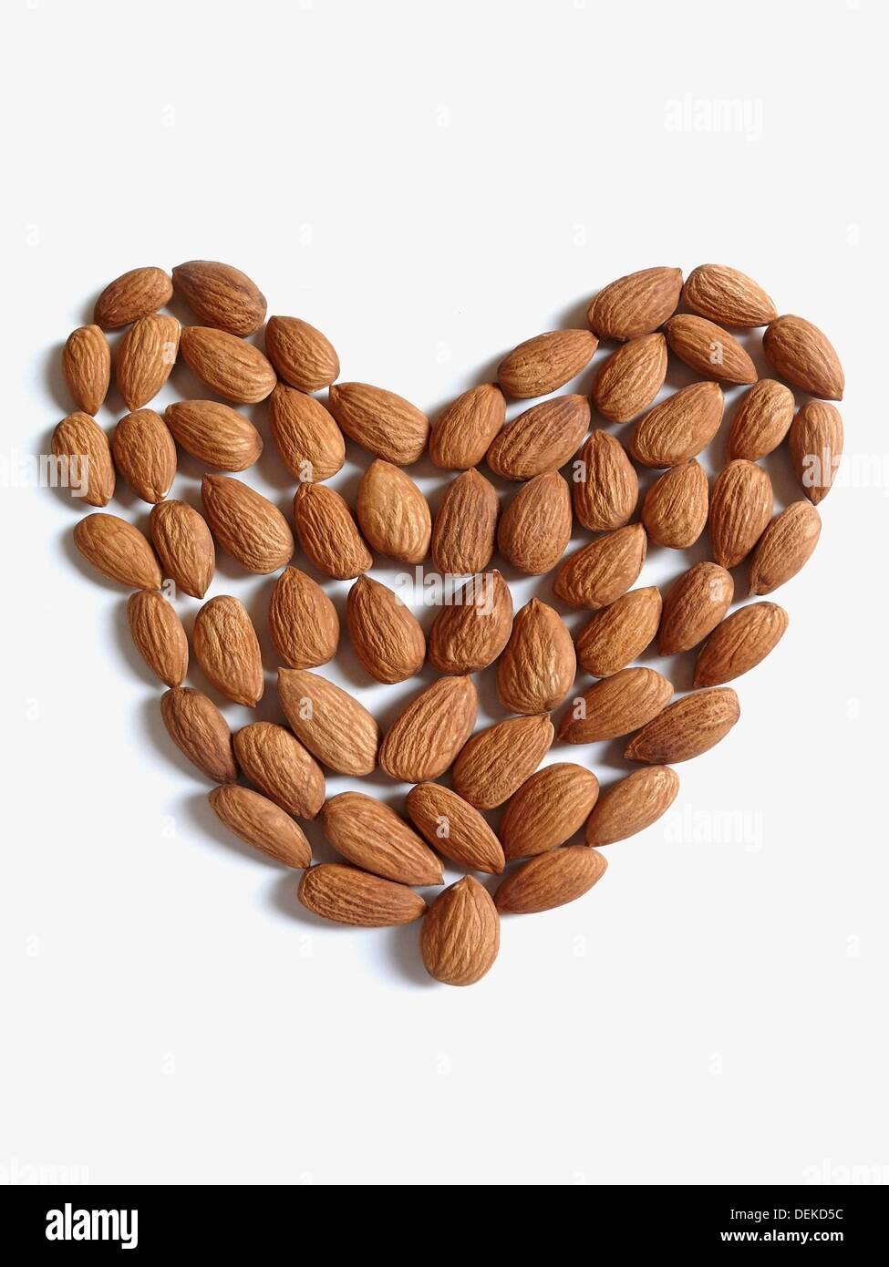 Almonds arranged in heart shape Stock Photo Alamy