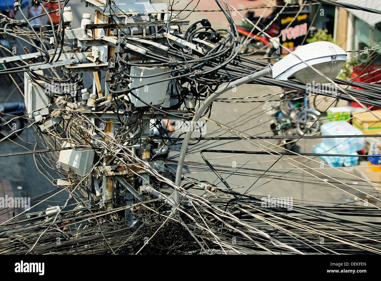 Typical asian style electrical wiring on Biu Vien street in the