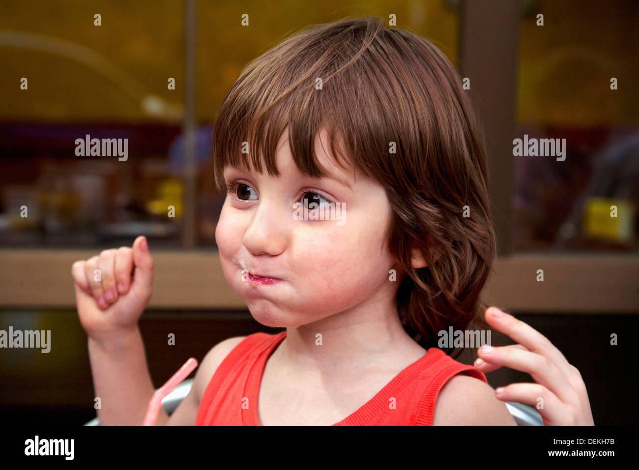 4 year old boy making a silly face, Barcelona, Spain. Stock Photo
