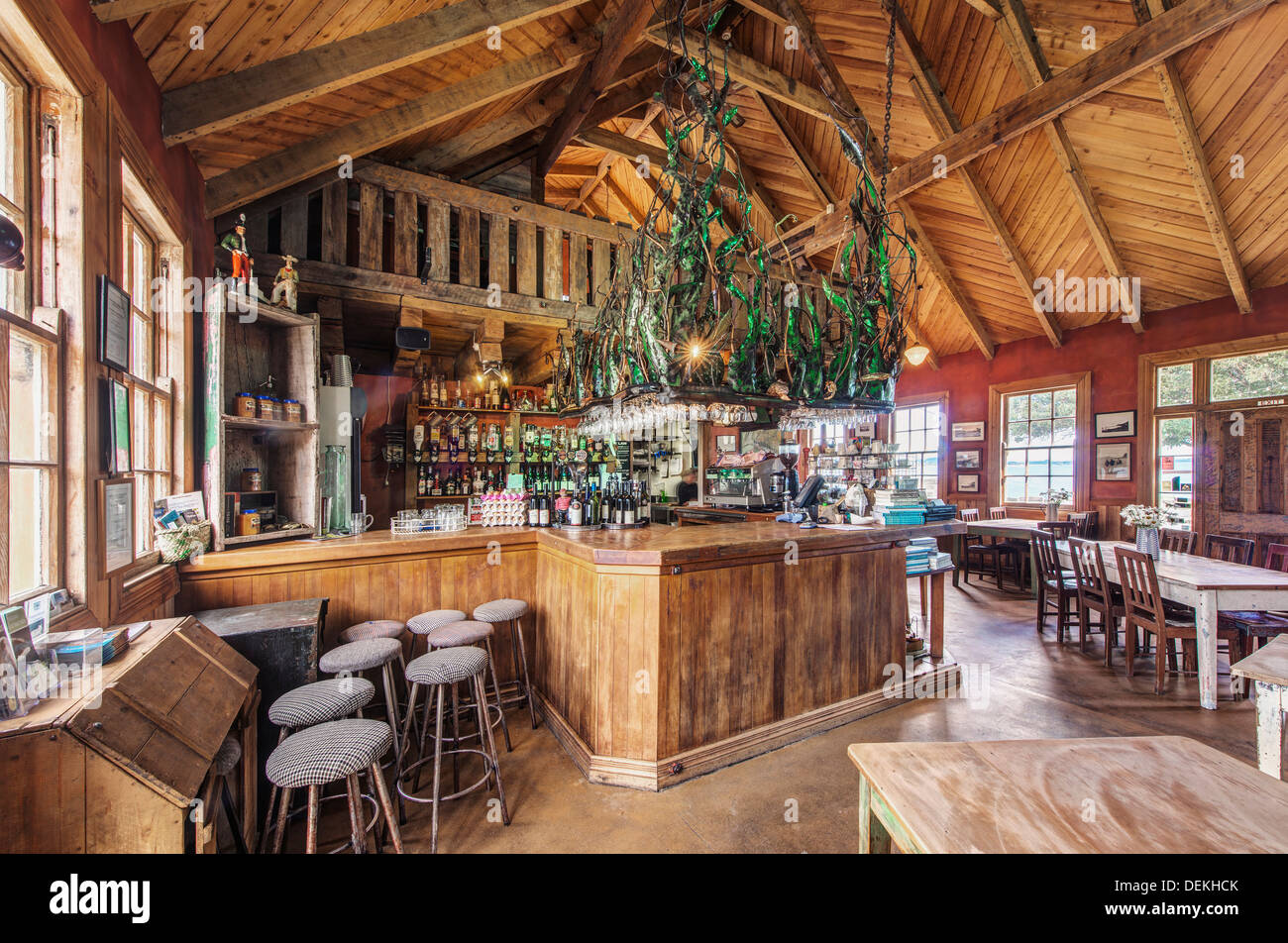 Empty chairs and tables in restaurant Stock Photo