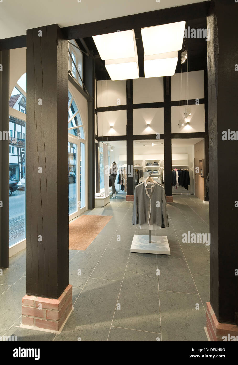 Clothes for sale in modern store Stock Photo Alamy