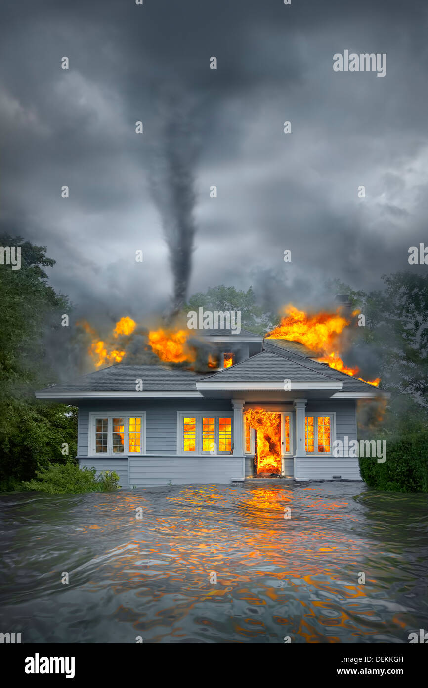 Burning house under tornado in flooded landscape Stock Photo
