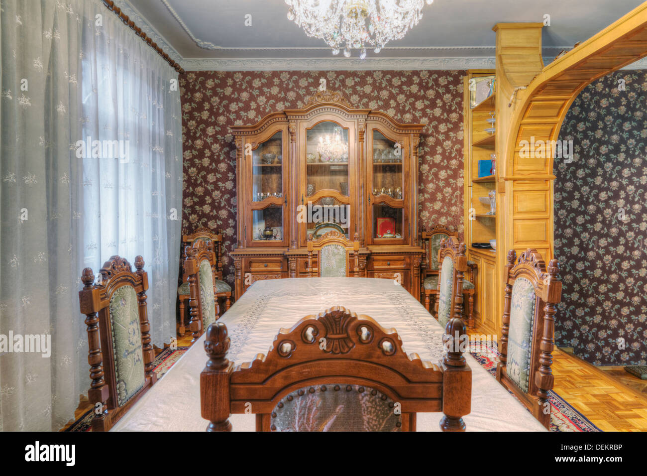Dining table and hutch in dining room Stock Photo Alamy