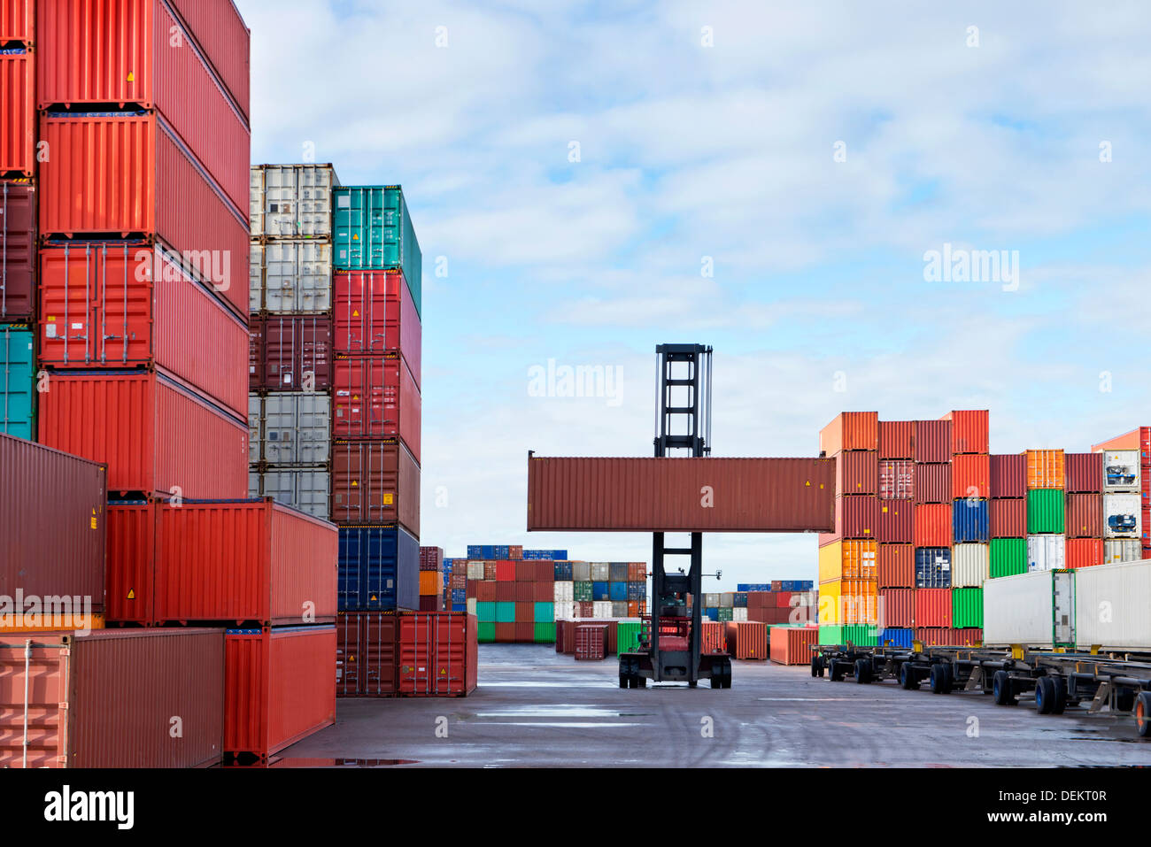 Crane lifting shipping container hires stock photography and images