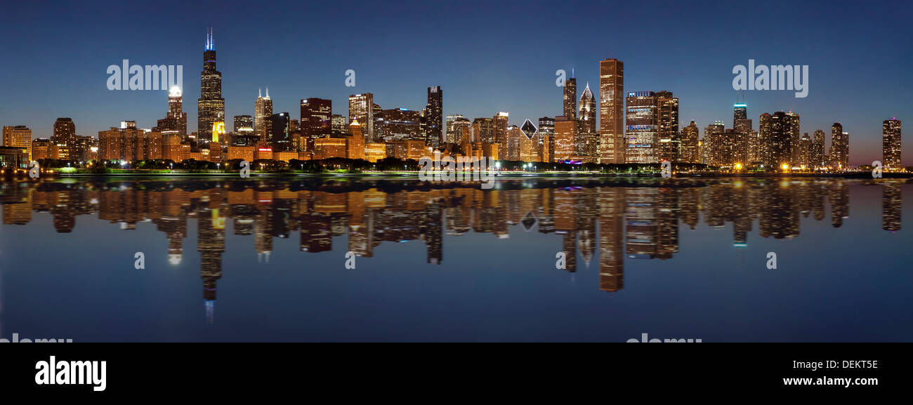 Chicago skyline lit up at night, Chicago, Illinois, United States Stock Photo
