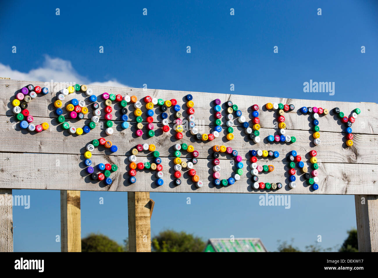 The community garden spelt out with plastic bottle tops at Mount Pleasant Ecological Park, Porthtowan, Cornwall, UK. Stock Photo