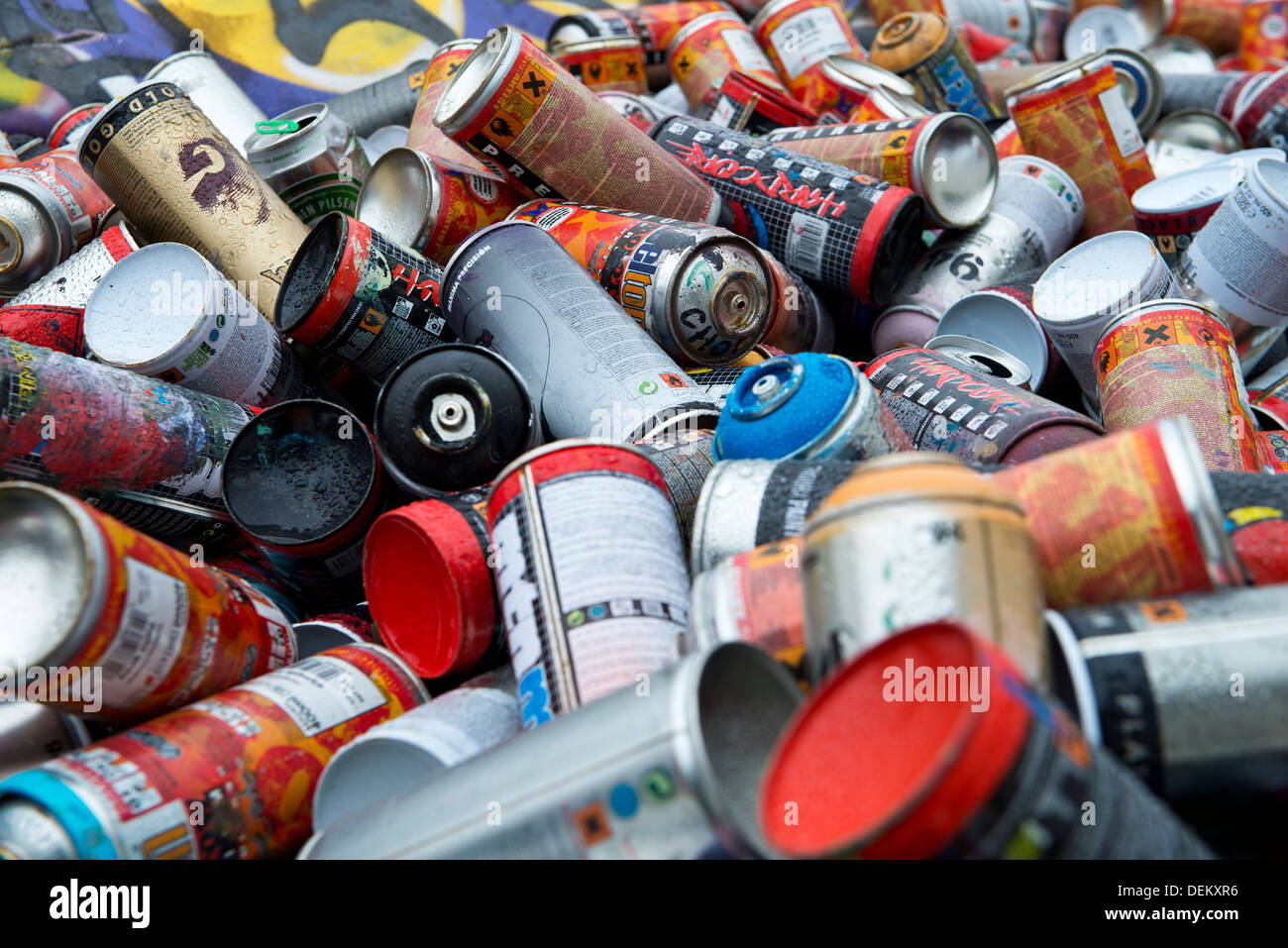 Used cans of spray paint in a bag Stock Photo - Alamy