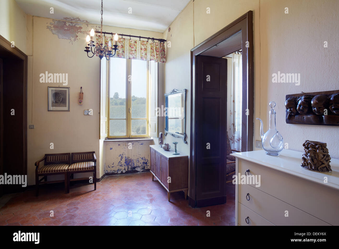 Old country house entrance room in Italy Stock Photo