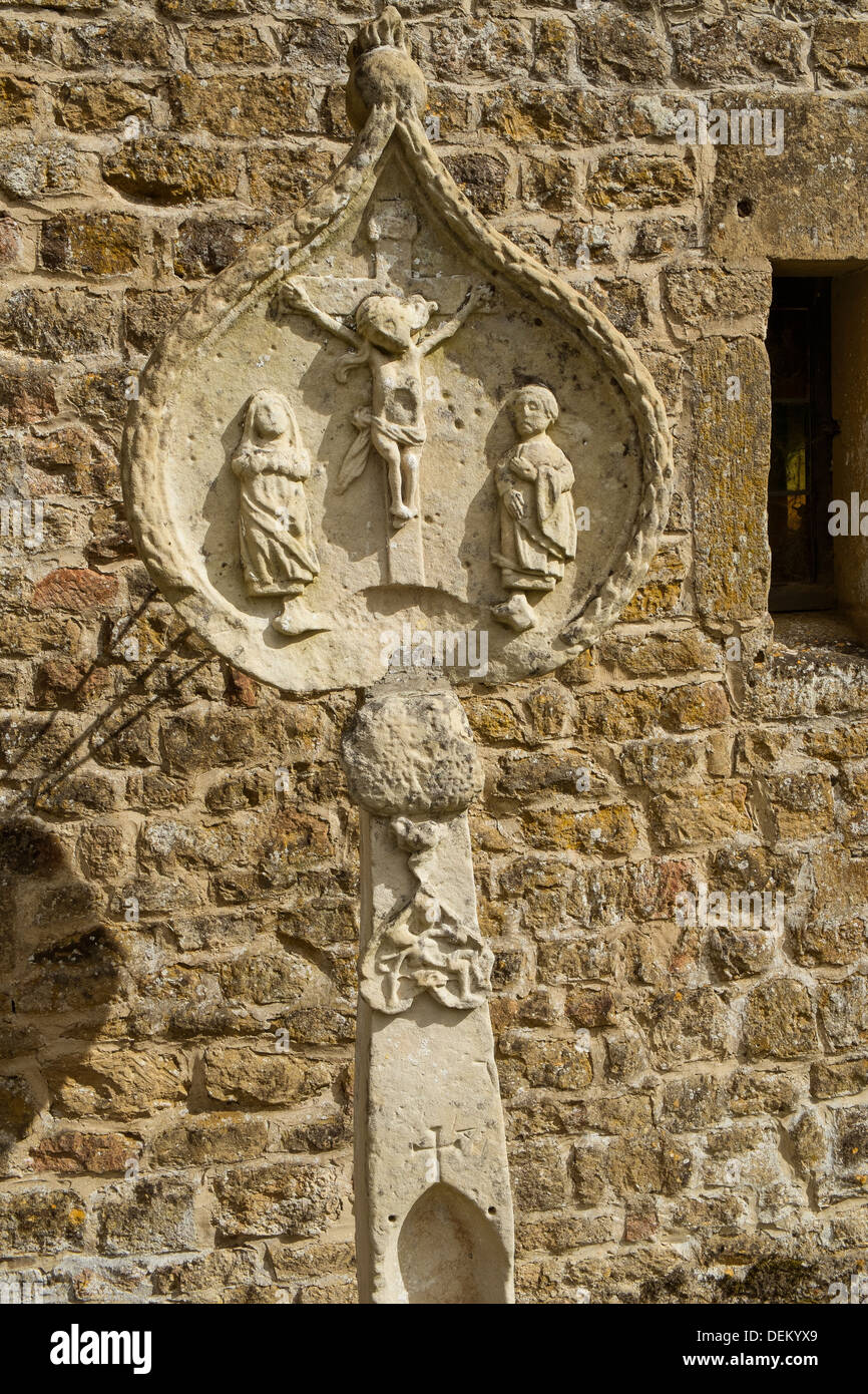 crucifixion christ cross stone carving Stock Photo