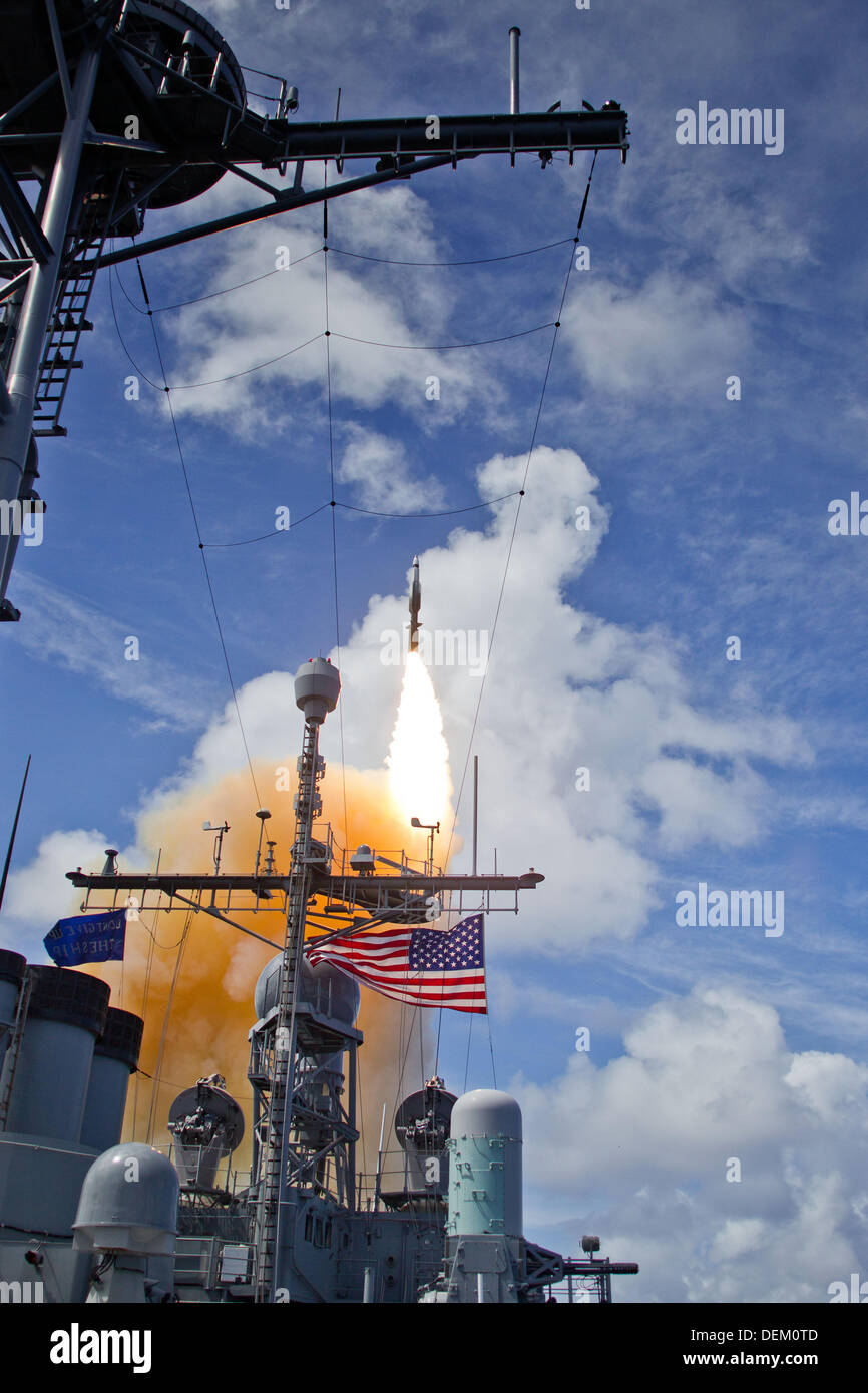 A SM-3 Block 1B interceptor is launched from the USS Lake Erie during an MDA test and successfully intercepted a complex short-range ballistic missile target off of the coast of Kauai, Hawaii, Sept. 18, 2013. Stock Photo