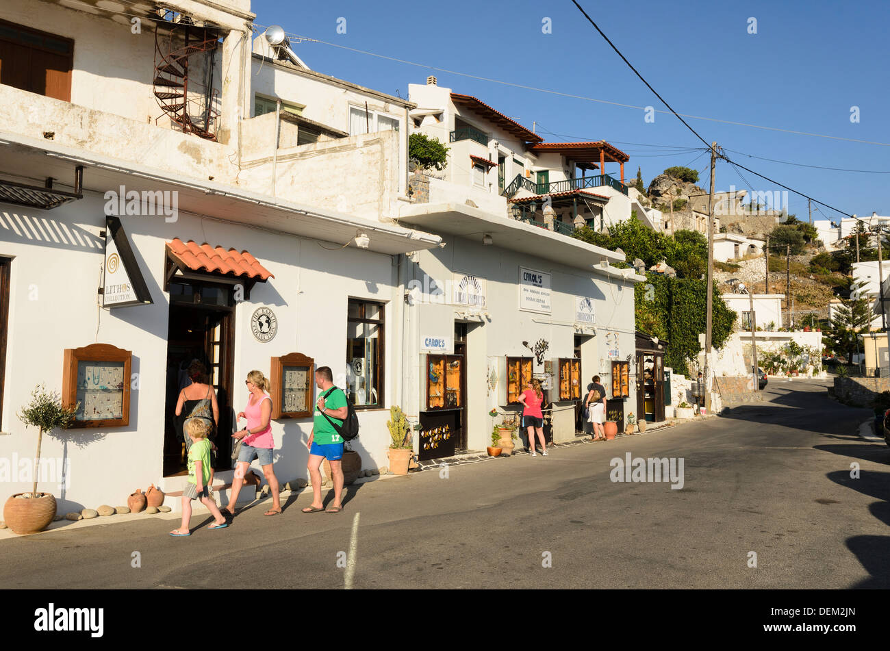Tourists walking in the village of Myrthios near Plakias - Crete, Greece Stock Photo