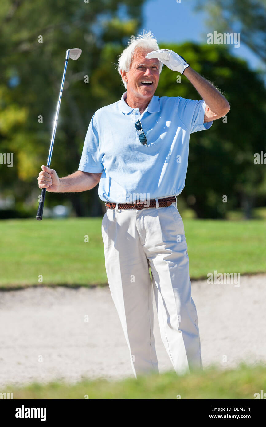 Old man playing golf hires stock photography and images Alamy