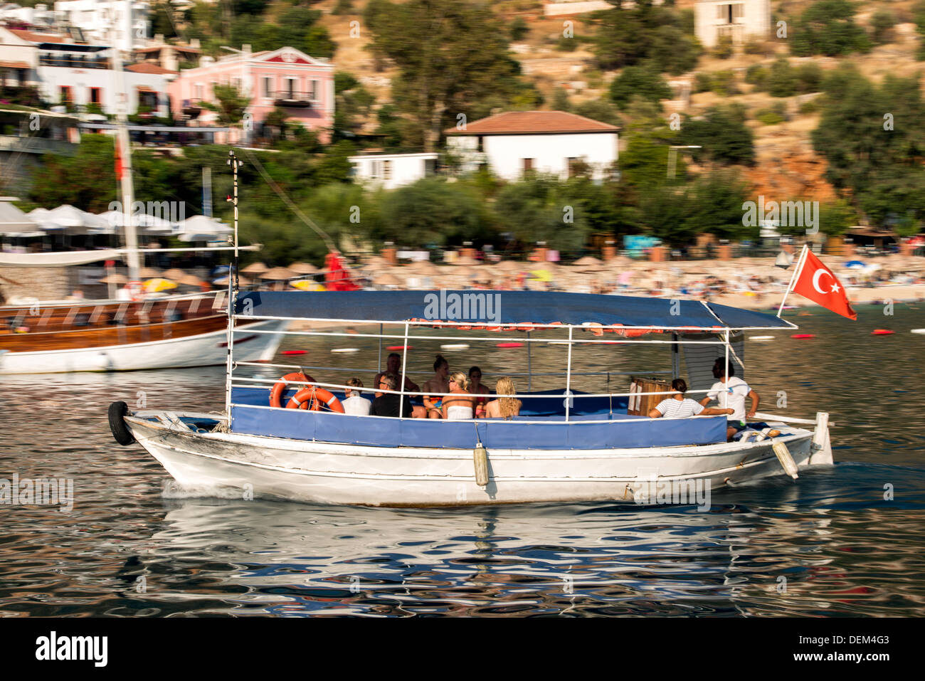 Small motorboat entering the harbour in Kas Turkey Stock Photo
