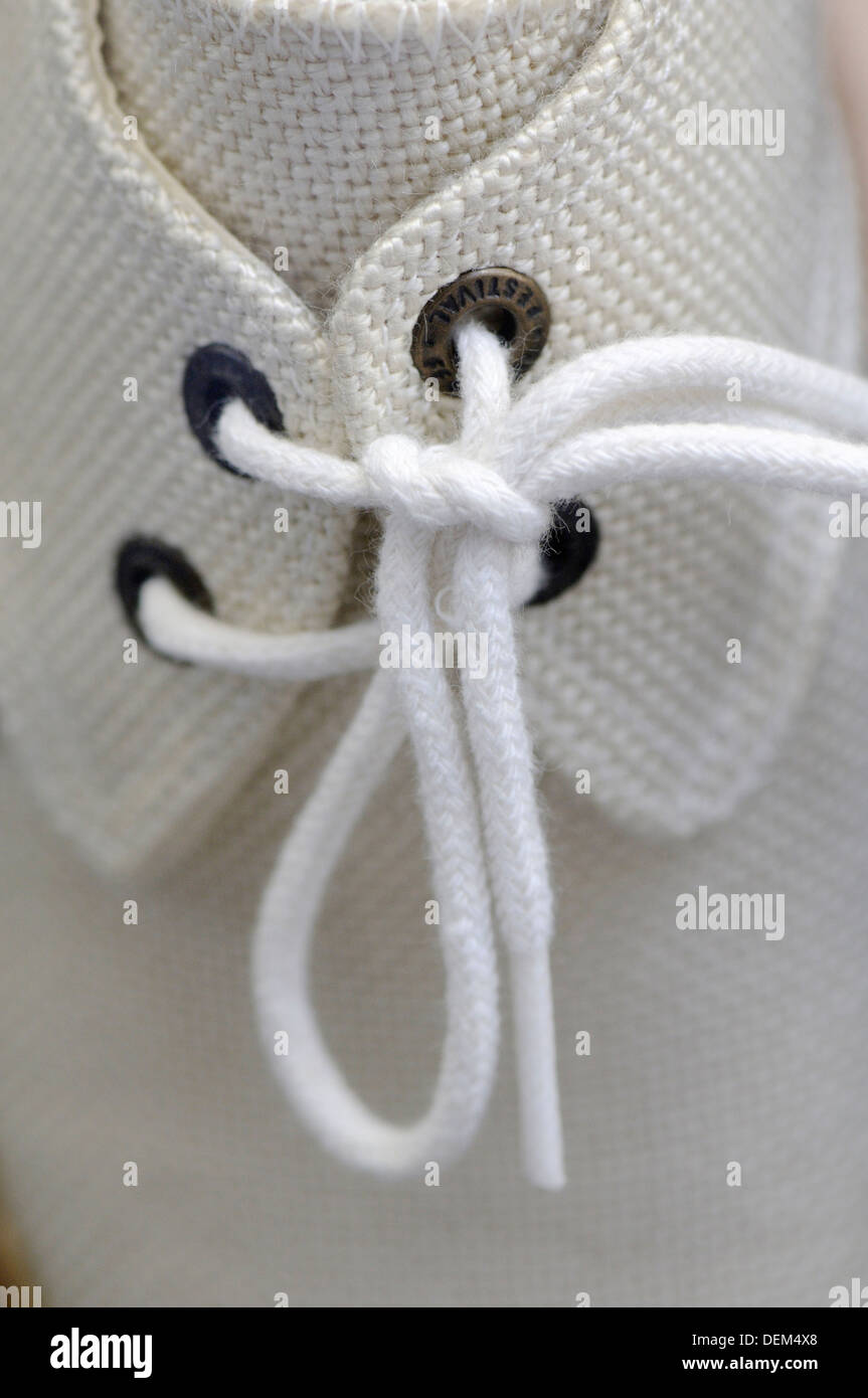 Shoelace in white shoe Stock Photo Alamy