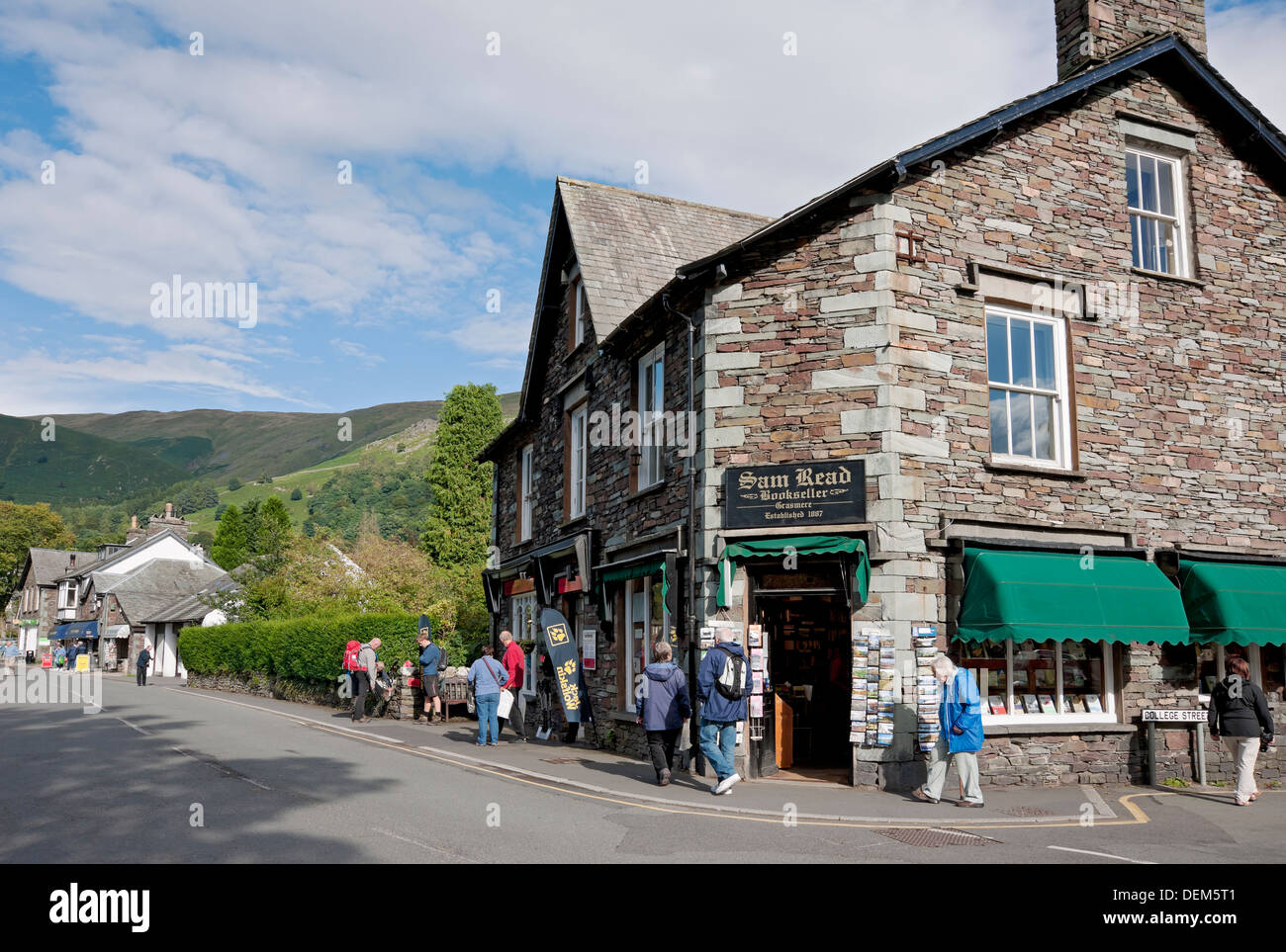 People tourists visitors walkers and shops stores in Grasmere village