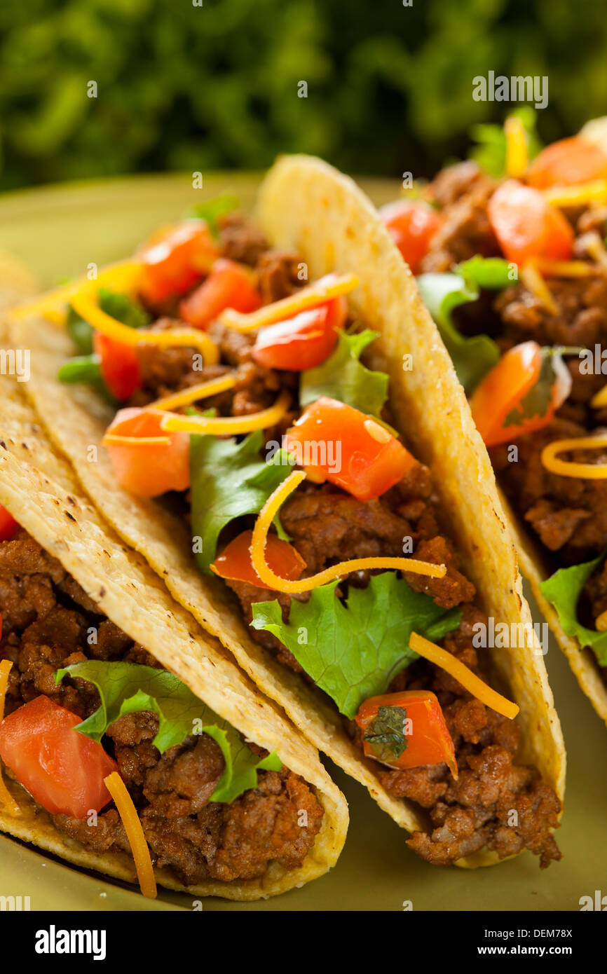 Homemade Ground Beef Tacos with Lettuce, Tomato, and Cheese Stock Photo Alamy
