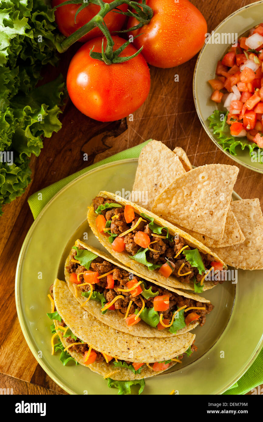 Homemade Ground Beef Tacos with Lettuce, Tomato, and Cheese Stock Photo Alamy