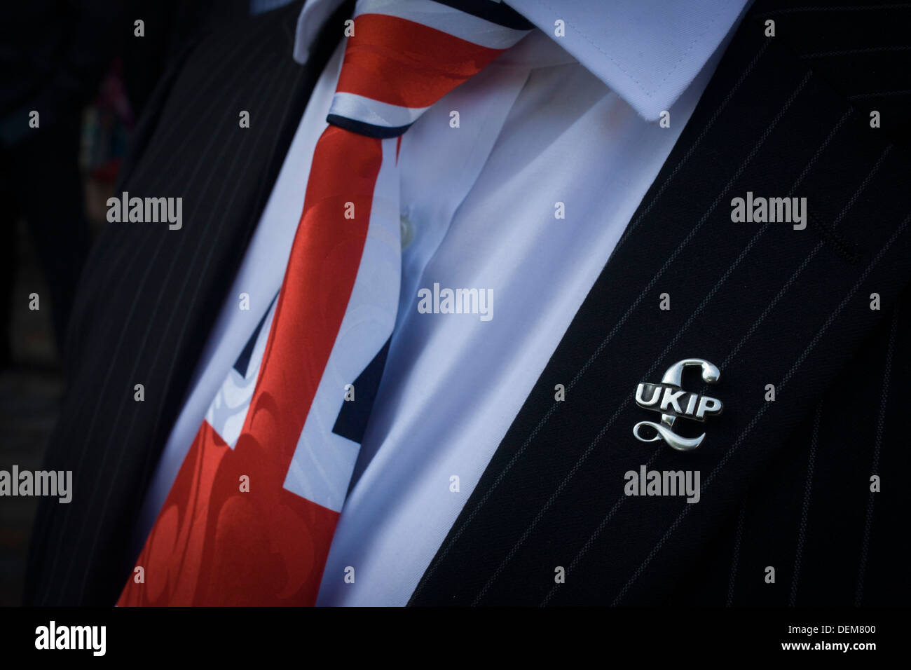 A Union jack tie and political pin detail of UKIP (UK Independence